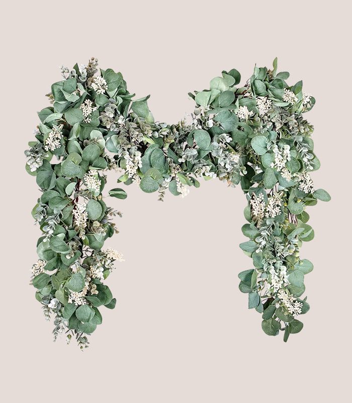garland-with-white-buds-and-artificial-greenery-vines